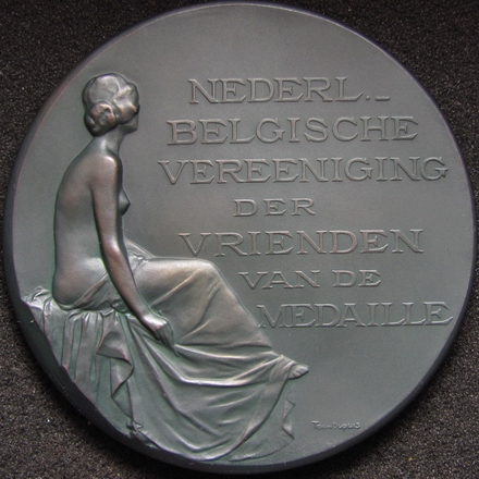 1908 Dr. H.J. de Dompierre Belgium Medal by T. Dupuis
Belgian Association of Friends of the  Medal by Toon Dupuis.   The medal is 68.90 mm in diameter and is made of silver that has been toned in greenish-gray (with a total weight of 4.698 ounces)  The medal has gorgeous even colored surfaces and wonderful details.  It comes in its very beautiful original case of issue. 
